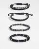 ASOS DESIGN ASOS DESIGN 4 pack faceted bead and fabric bracelet in black - 1