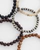 ASOS DESIGN ASOS DESIGN 5 pack cat eye and marble effect beaded bracelets in brown - 3