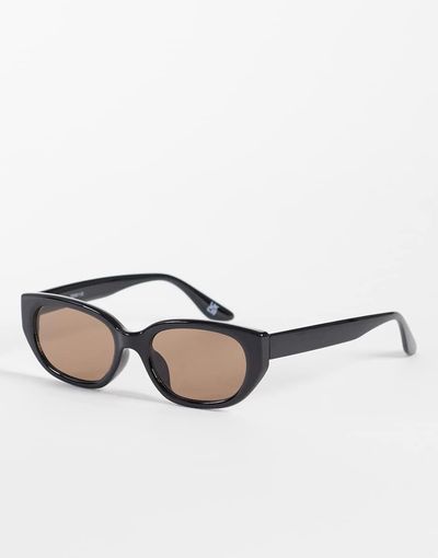 ASOS DESIGN ASOS DESIGN angled sunglasses in black frame with brown lens