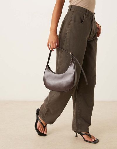 ASOS DESIGN ASOS DESIGN asymmetric scoop shoulder bag with buckle detail in chocolate-Brown