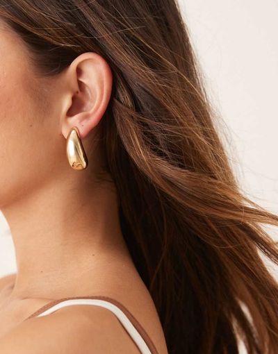 ASOS DESIGN ASOS DESIGN asymmetric teardrop stud earrings in gold tone