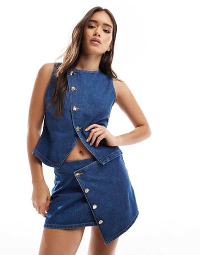 ASOS DESIGN ASOS DESIGN asymmetric wrap front denim micro mini skirt with gold buttons in mid blue - part of a set