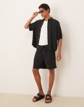 ASOS DESIGN ASOS DESIGN baggy fit pull on linen rich shorts in black - part of a set