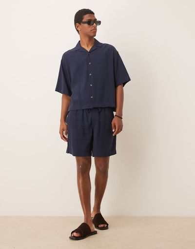 ASOS DESIGN ASOS DESIGN baggy fit pull on shorts in navy linen blend - part of a set