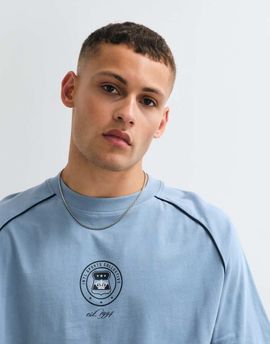 ASOS DESIGN ASOS DESIGN boxy oversized cut and sew T-shirt with sports graphic in blue