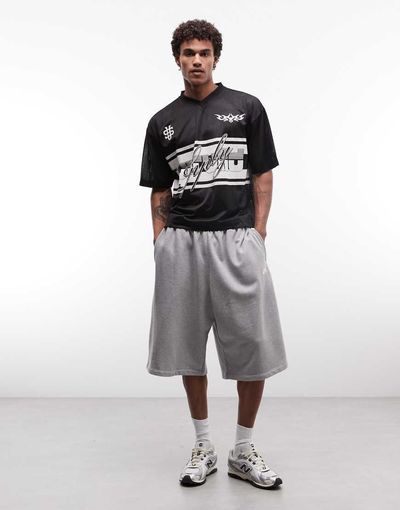 ASOS DESIGN ASOS DESIGN boxy oversized drop shoulder T-shirt with football graphic in black airtex fabric