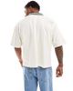 ASOS DESIGN ASOS DESIGN boxy oversized polo shirt in off white with soccer front print - 2