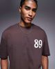 ASOS DESIGN ASOS DESIGN boxy oversized T-shirt with grunge sports graphic in brown - 2
