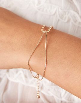 ASOS DESIGN ASOS DESIGN bracelet with dainty cuff and chain detail in gold tone