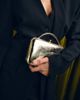 ASOS DESIGN ASOS DESIGN coated round frame clutch bag in gold - 2