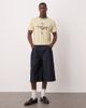 ASOS DESIGN ASOS DESIGN cropped T-shirt with stripe and graphic in cream sports fabric-Yellow - 4