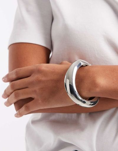 ASOS DESIGN ASOS DESIGN cuff bangle with wavy design in silver tone
