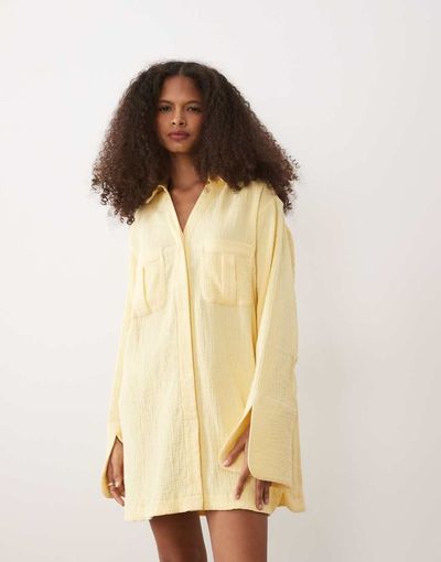 ASOS DESIGN ASOS DESIGN double cloth mini shirt dress with wide cuffs and oversized pockets in lemon-Multi