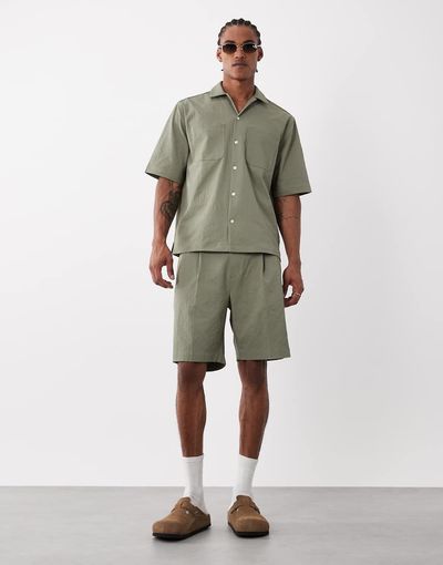 ASOS DESIGN ASOS DESIGN dressy regular shorts in khaki-green seersucker - part of a set