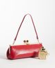 ASOS DESIGN ASOS DESIGN elongated frame clutch bag with shoulder strap in red - 2