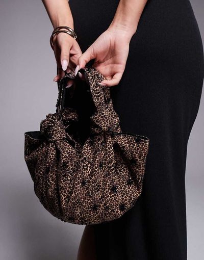 ASOS DESIGN ASOS DESIGN embellished slouchy clutch purse with knot handles in leopard print-Multi