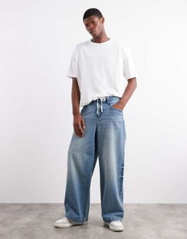 ASOS DESIGN ASOS DESIGN extreme baggy fit jeans with embroidered back pocket in light wash blue