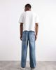 ASOS DESIGN ASOS DESIGN extreme baggy fit jeans with embroidered back pocket in light wash blue - 2