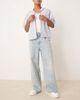 ASOS DESIGN ASOS DESIGN extreme baggy jeans with front pleats in light wash blue - 1