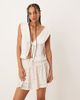ASOS DESIGN ASOS DESIGN eyelet mid rise mini skort in natural-White - 1