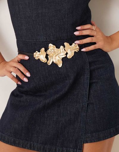 ASOS DESIGN ASOS DESIGN faux leather rope tie belt with abstract gold floral buckle in black