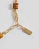 ASOS DESIGN ASOS DESIGN faux tigers eye stone set bracelet in gold - 3