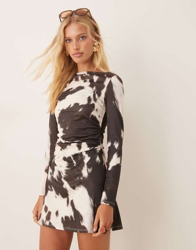 ASOS DESIGN ASOS DESIGN fit and flare long sleeve mini dress in cow print-Multi