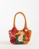 ASOS DESIGN ASOS DESIGN floral embellished bucket clutch bag in orange - 1