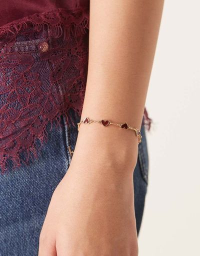 ASOS DESIGN ASOS DESIGN gold chain heart bracelet with burgundy enamel