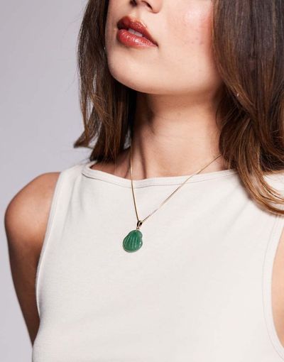 ASOS DESIGN ASOS DESIGN gold tone necklace with semi-precious green shell pendant