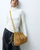 ASOS DESIGN ASOS DESIGN hair on leather drawstring pouch clutch bag with detachable strap in camel-brown-Green - 1