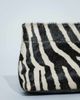 ASOS DESIGN ASOS DESIGN hair on leather elongated pouch grab bag in zebra print-Multi - 4