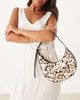 ASOS DESIGN ASOS DESIGN hair on real leather asymmetric scoop shoulder bag with buckle detail in cow print-Multi - 1