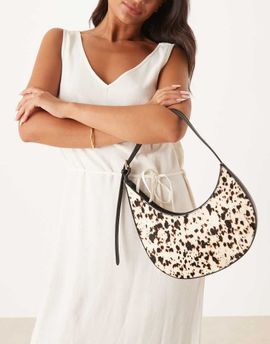 ASOS DESIGN ASOS DESIGN hair on real leather asymmetric scoop shoulder bag with buckle detail in cow print-Multi