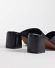 ASOS DESIGN ASOS DESIGN Hammer premium leather asymmetric mid heeled mules in black - 4