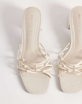 ASOS DESIGN ASOS DESIGN Hana strappy knotted block heeled mules in natural linen-White