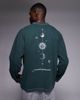 ASOS DESIGN ASOS DESIGN heavyweight oversized long sleeve T-shirt with celestial spine graphic in washed green - 1