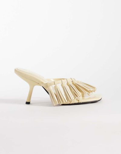 ASOS DESIGN ASOS DESIGN Hibernate tassel trim mid heeled mules in buttermilk-Yellow