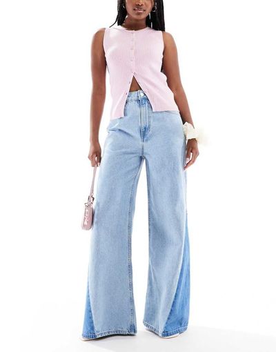ASOS DESIGN ASOS DESIGN high rise palazzo jeans with rips and let down hem-Blue