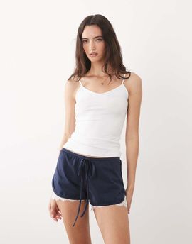 ASOS DESIGN ASOS DESIGN jersey shorts with lace under layer in navy