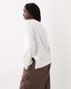 ASOS DESIGN ASOS DESIGN Knotted hem detail crew neck long sleeve top in ecru-White - 3