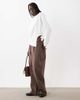 ASOS DESIGN ASOS DESIGN Knotted hem detail crew neck long sleeve top in ecru-White - 4