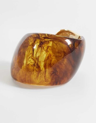 ASOS DESIGN ASOS DESIGN large cuff bracelet in brown resin with gold tone trim