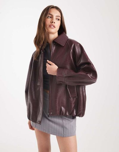 ASOS DESIGN ASOS DESIGN leather look oversized bomber jacket in burgundy-Red