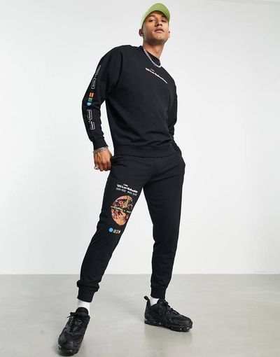 ASOS DESIGN ASOS DESIGN lightweight tracksuit in black with multi placement tech prints-Blues