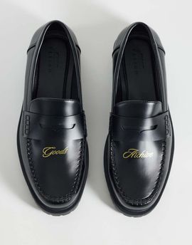 ASOS DESIGN ASOS DESIGN loafers with embossed text and cleated sole in black
