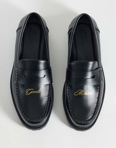 ASOS DESIGN ASOS DESIGN loafers with embossed text and cleated sole in black