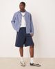 ASOS DESIGN ASOS DESIGN long length pleated shorts in navy - 4