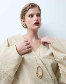 ASOS DESIGN ASOS DESIGN long necklace with abstract pendant in gold tone