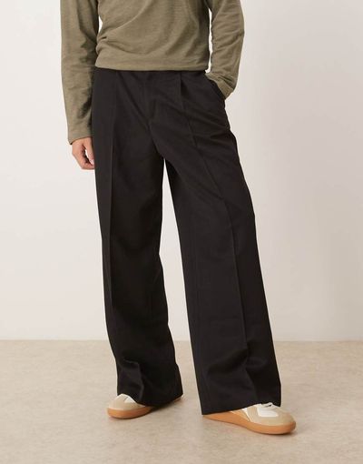 ASOS DESIGN ASOS DESIGN loose leg pleated dress pants with exposed button in black